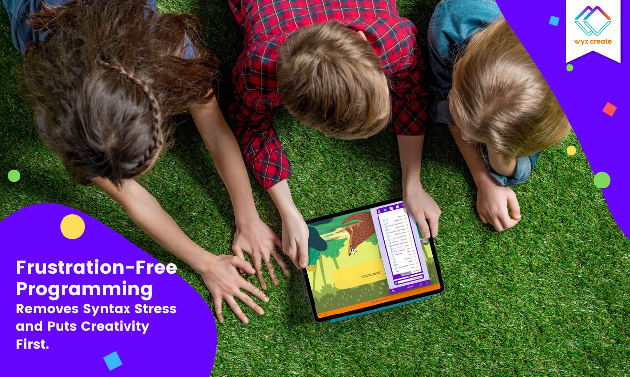 Promotional image for Wyz Create featuring three children lying down on grass around a single ipad building an app, with the words "frustration-free programing" on the left-hand side.