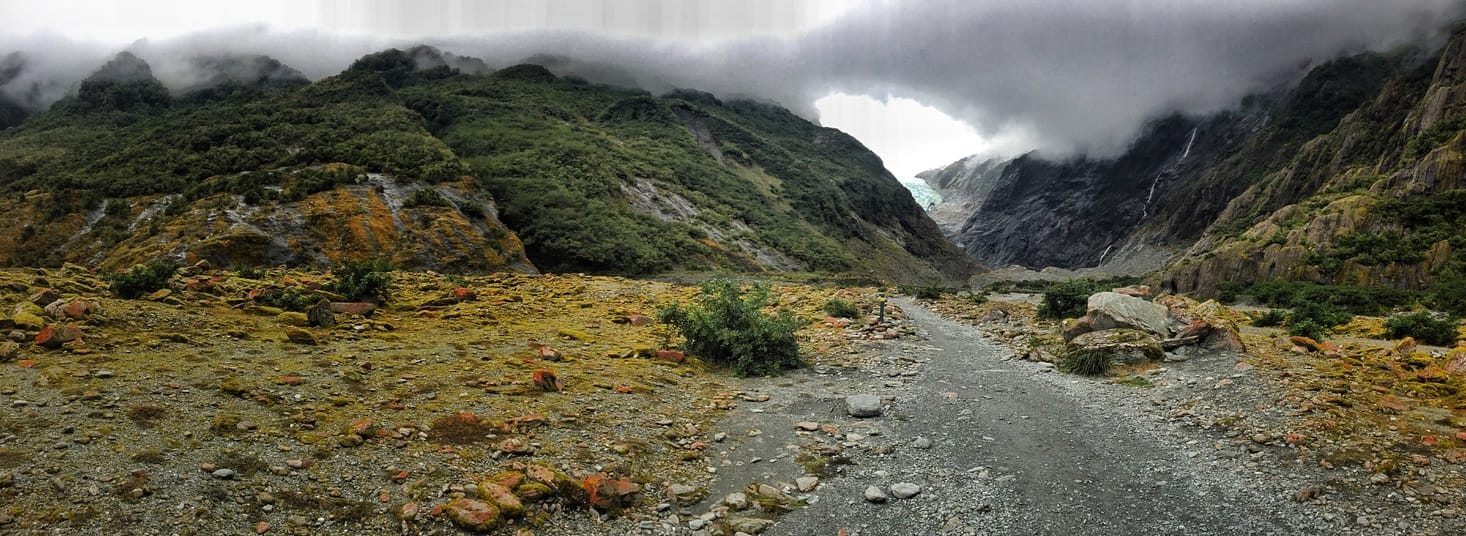 8A7735C2-6B59-4E9C-B692-9D5B5DAFD3E7_1_105_c Saint Josef Glacier with overhanging clouds in New Zealand.
